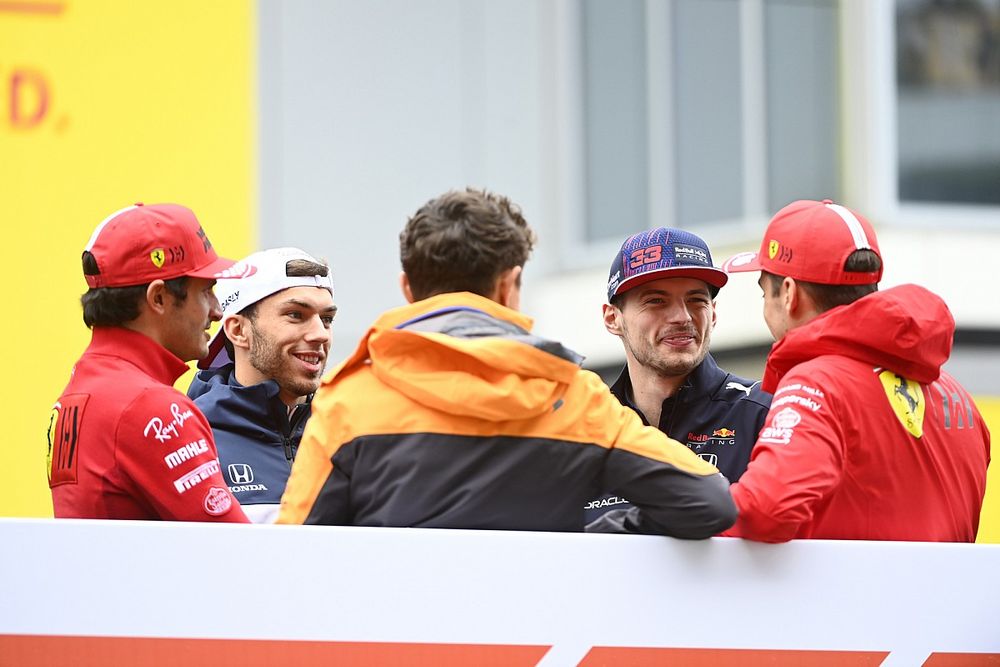 Carlos Sainz Jr., Ferrari, Pierre Gasly, AlphaTauri, Lando Norris, McLaren, Max Verstappen, Red Bull Racing, and Charles Leclerc, Ferrari, in the drivers parade