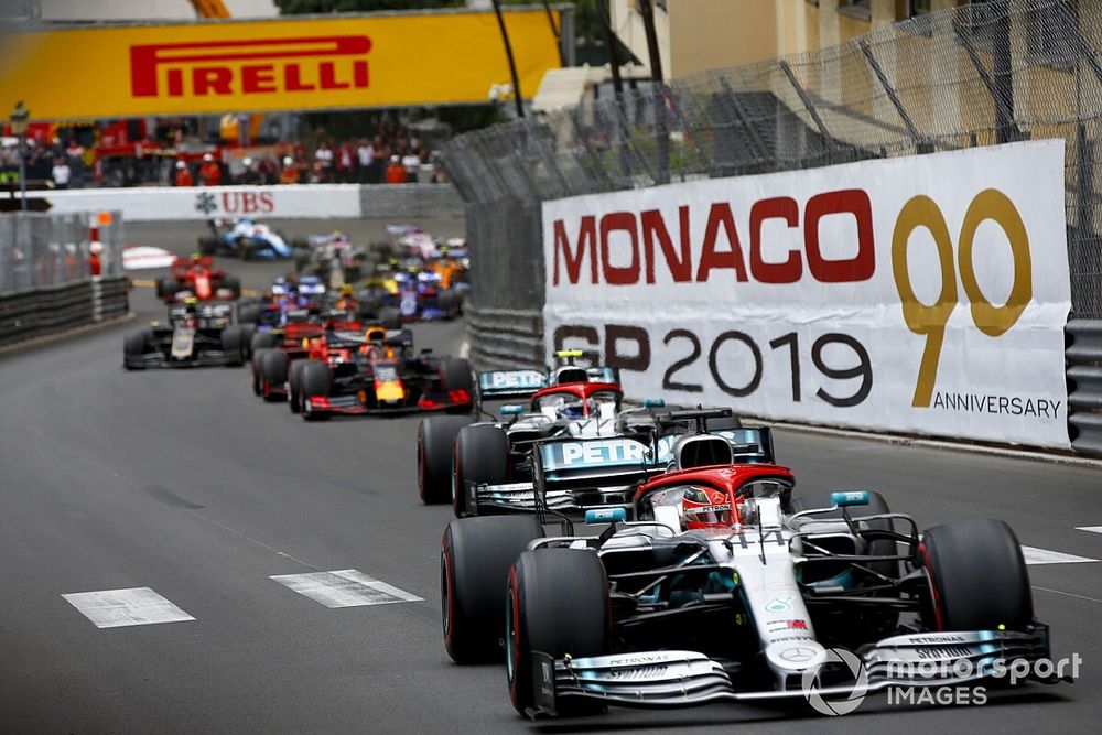 Lewis Hamilton, Mercedes AMG F1 W10 leads Valtteri Bottas, Mercedes AMG W10 and Max Verstappen, Red Bull Racing RB15 at the start of the race