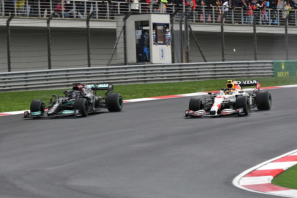 Lewis Hamilton, Mercedes W12, battles with Sergio Perez, Red Bull Racing RB16B