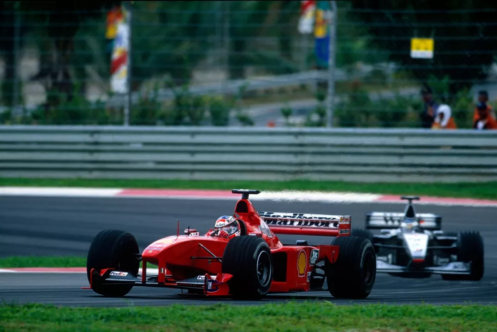 Michael Schumacher,  Ferrari F399, Mika Hakkinen, McLaren MP4/14 Mercedes