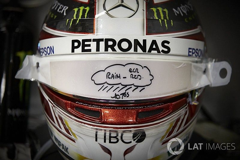 The helmet of Lewis Hamilton, Mercedes AMG F1, with rain visor fitted