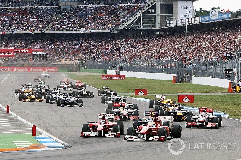 Felipe Massa, Ferrari F10 leads Fernando Alonso, Ferrari F10 at the start of the race