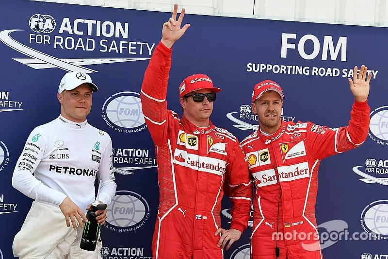 Le poleman Kimi Raikkonen, Ferrari, le deuxième, Sebastian Vettel, Ferrari, le troisième, Valtteri Bottas, Mercedes AMG F1