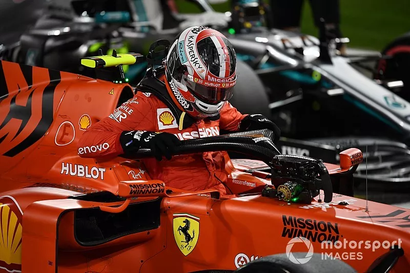 Charles Leclerc, Ferrari, climbs from his car after securing pole in F1 for the first time in his career