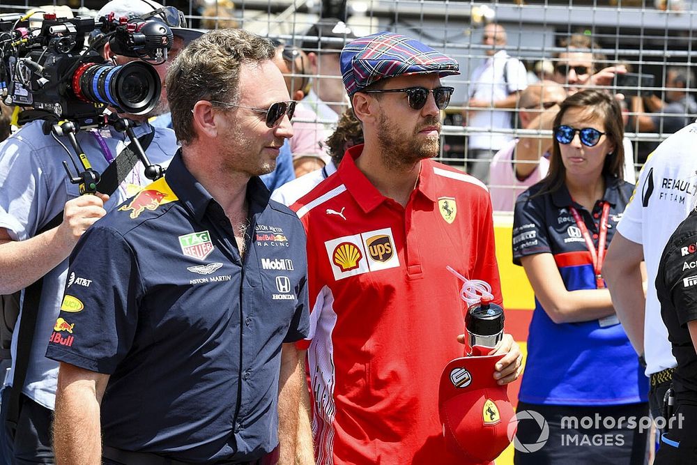 Christian Horner, Team Principal, Red Bull Racing, with Sebastian Vettel, Ferrari