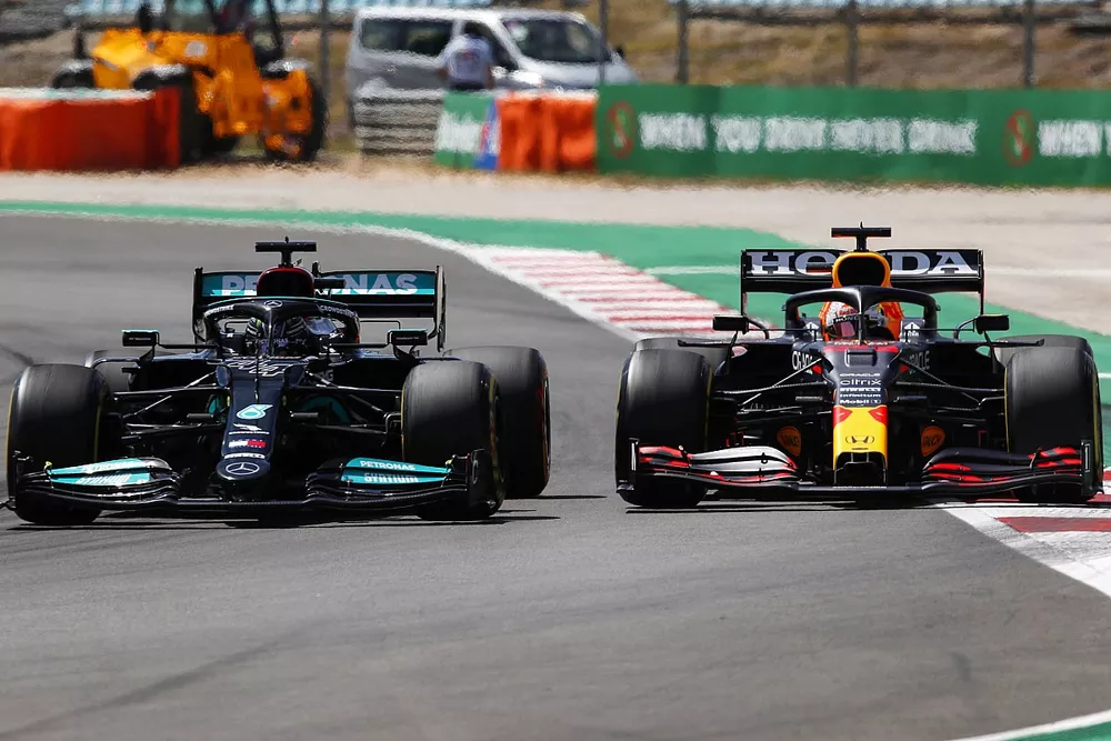 Lewis Hamilton, Mercedes W12, battles with Max Verstappen, Red Bull Racing RB16B