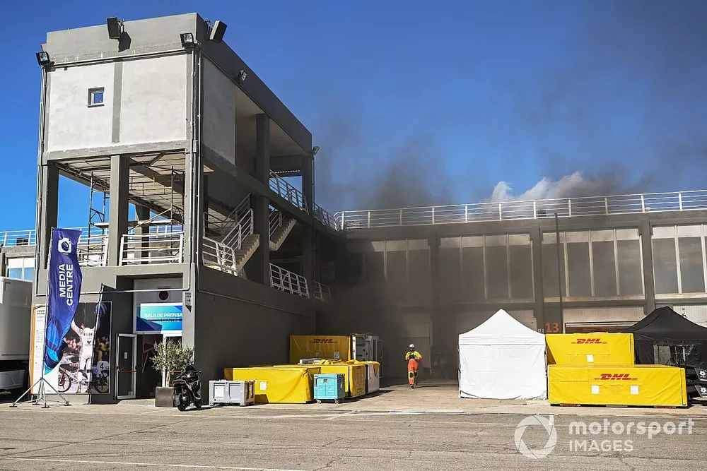 Smoke from the pit lane below the media centre