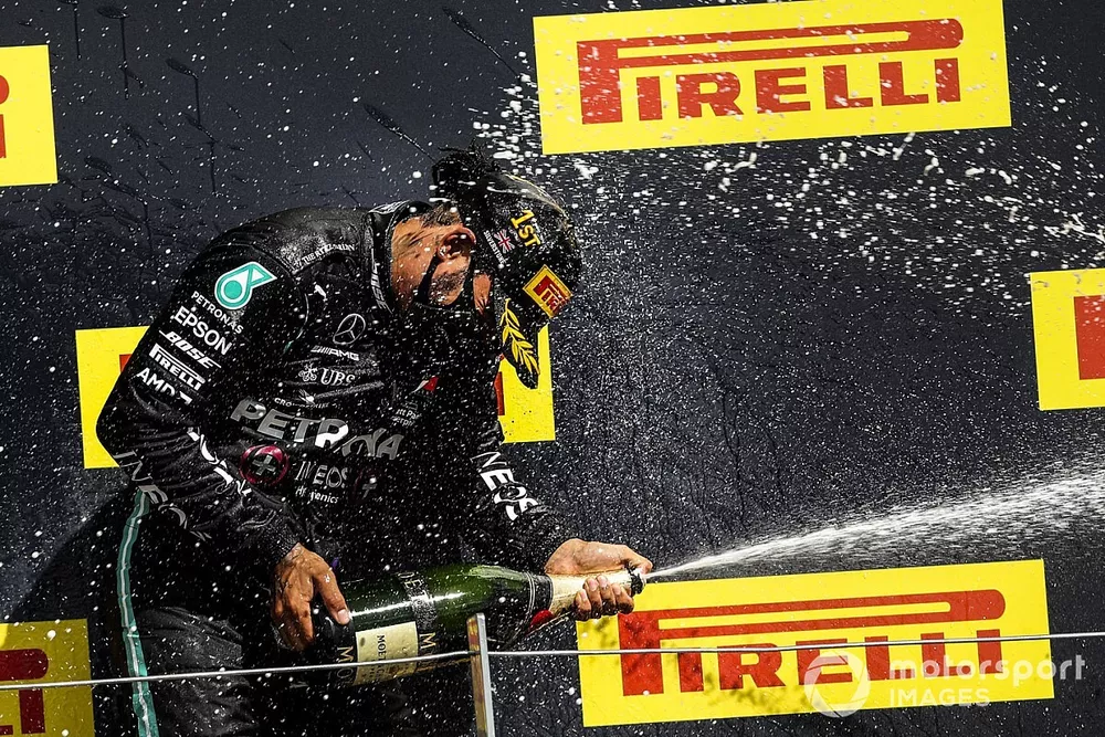 Race Winner Lewis Hamilton, Mercedes-AMG F1 celebrates on the podium with the champagne