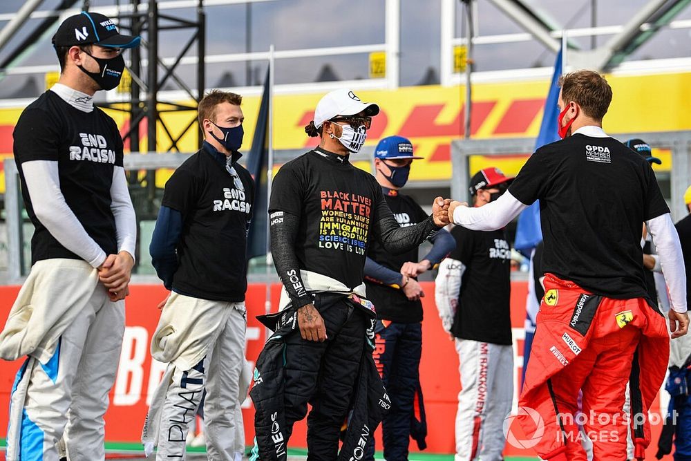 Nicholas Latifi, Williams Racing, Daniil Kvyat, AlphaTauri, Lewis Hamilton, Mercedes-AMG F1, Sebastian Vettel, Ferrari, and the other drivers gather in support of the End Racism campaign prior to the start