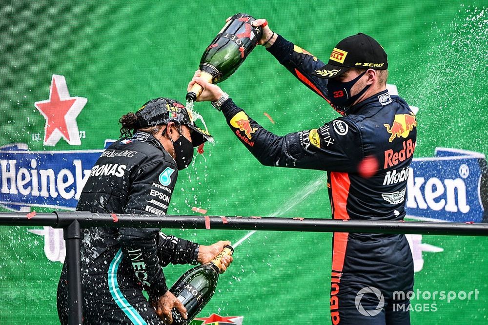 Max Verstappen, Red Bull Racing, 3rd position, pours Champagne over Lewis Hamilton, Mercedes-AMG F1, 1st position, on the podium