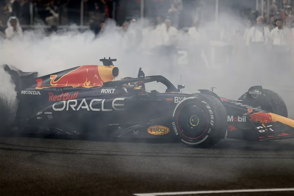 Max Verstappen, Red Bull Racing RB19, 1st position, performs donuts at the end of the race