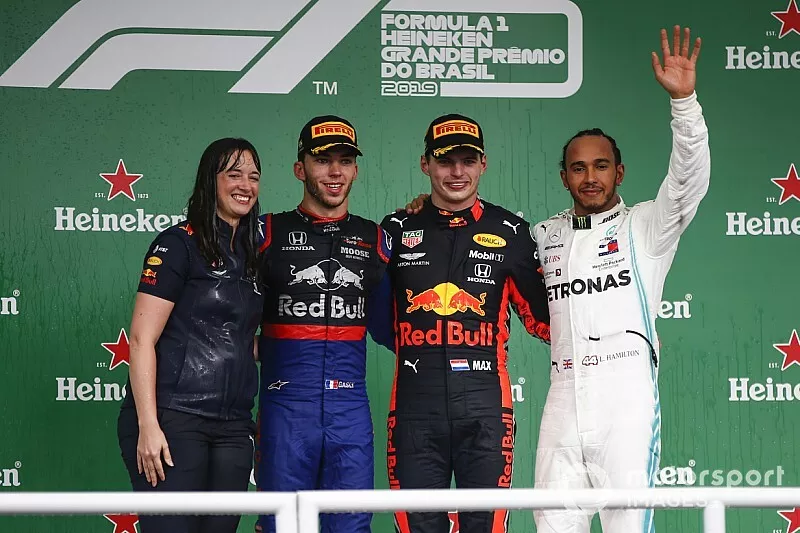 Podium: race winner Max Verstappen, Red Bull Racing, second place Pierre Gasly, Toro Rosso, third place Lewis Hamilton, Mercedes AMG F1, Hannah Schmitz, Red Bull Racing strategy engineer at Brazilian GP