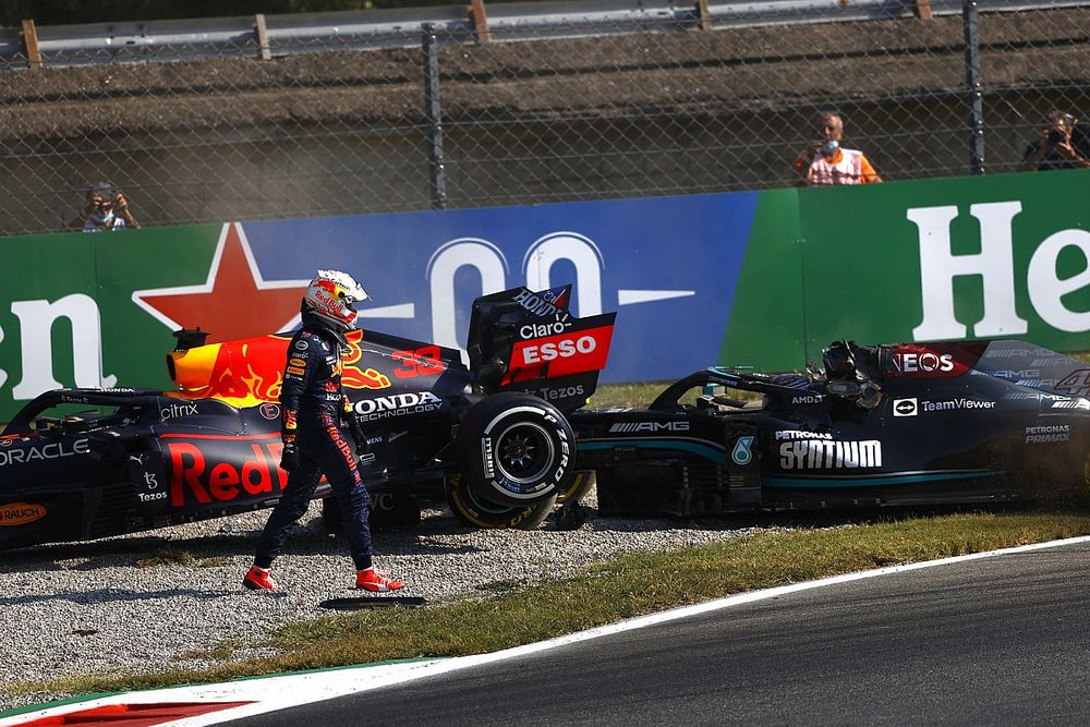 Max Verstappen, Red Bull Racing, walks away after crashing out with Lewis Hamilton, Mercedes