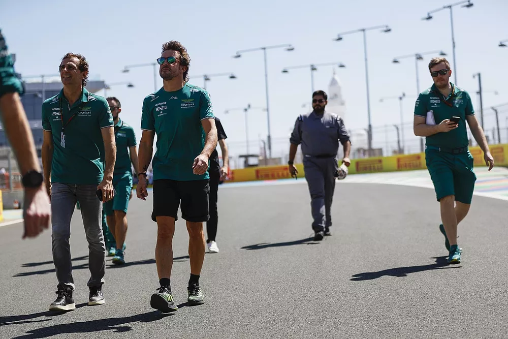 Fernando Alonso, Aston Martin F1 Team, walks the track with Pedro de la Rosa, Team Ambassador, Aston Martin F1 Team