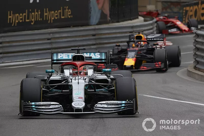 Lewis Hamilton, Mercedes AMG F1 W10, leads Max Verstappen, Red Bull Racing RB15
