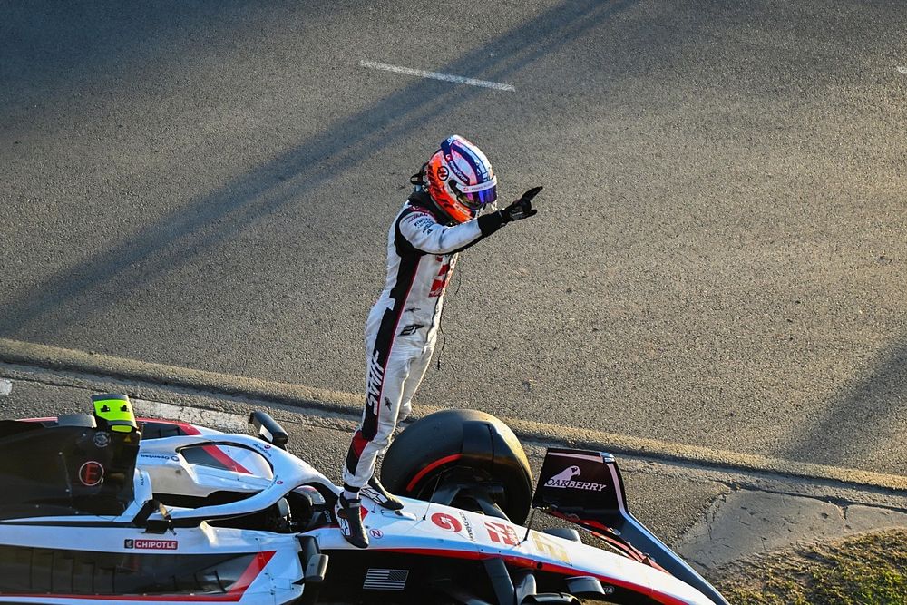 Nico Hulkenberg, Haas VF-23, stops and climbs out of his car at the end of the race