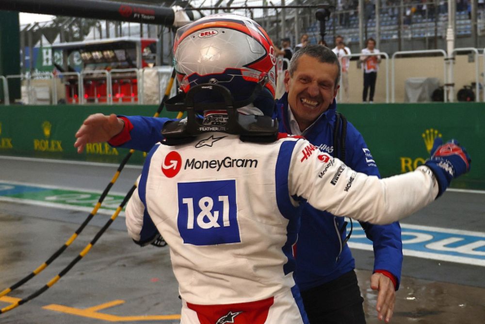 Pole man Kevin Magnussen, Haas F1 Team, celebrates with Guenther Steiner, Team Principal, Haas F1
