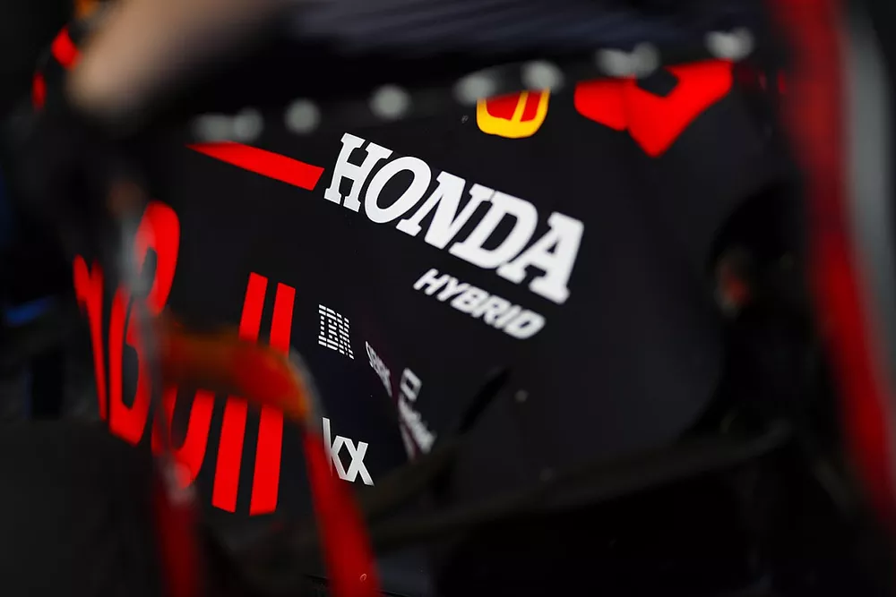 A Honda logo on a Red Bull engine cover