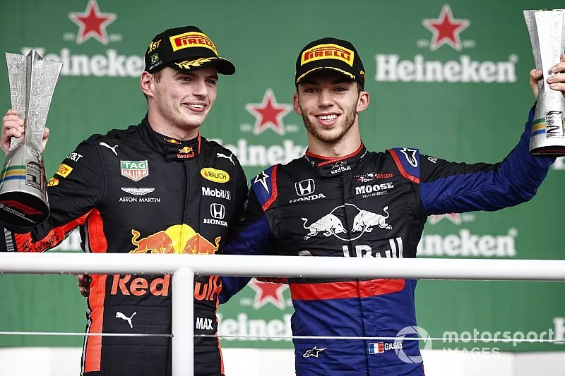 Max Verstappen, Red Bull Racing, 1st position, and Pierre Gasly, Toro Rosso, 2nd position, on the podium with their trophies