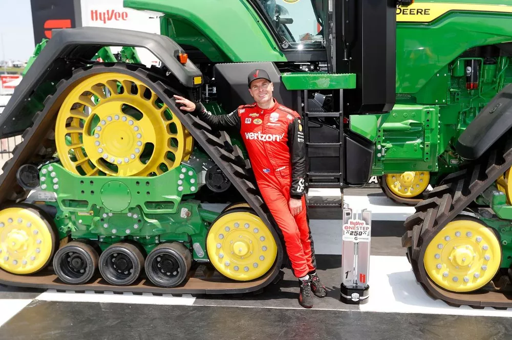 Will Power, Team Penske Chevrolet celebrates with a giant tractor