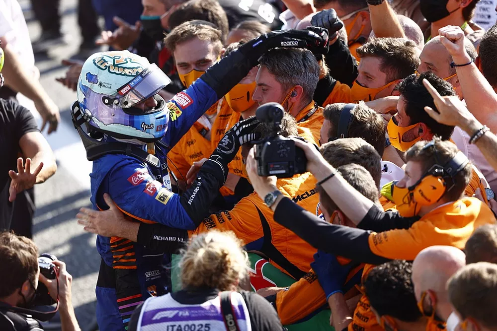Daniel Ricciardo, McLaren, 1st position, celebrates with his team in Parc Ferme