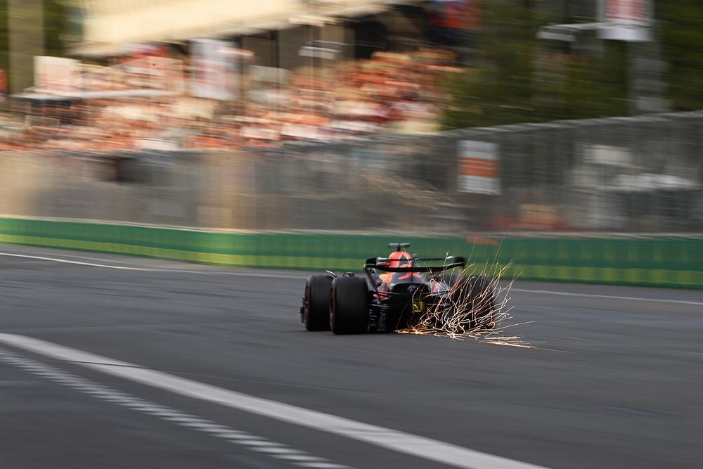 Sparks fly from Max Verstappen, Red Bull Racing RB18