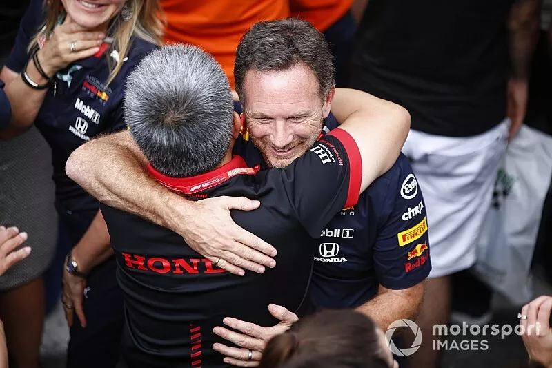 Masashi Yamamoto, General Manager, Honda Motorsport, and Christian Horner, Team Principal, Red Bull Racing, celebrate in Parc Ferme