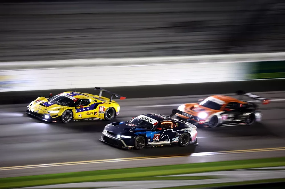 The #81 DragonSpeed Ferrari 296 GT3 of Albert Costa, Davide Rigon, Miguel Molina, and Thomas Neubauer races with #64 Ford Multimatic Motorsports Ford Mustang GT3: Mike Rockenfeller, Sebastian Priaulx, Austin Cindric