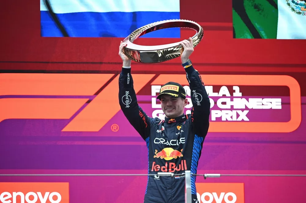 Max Verstappen, Red Bull Racing, 1st position, lifts the winners trophy