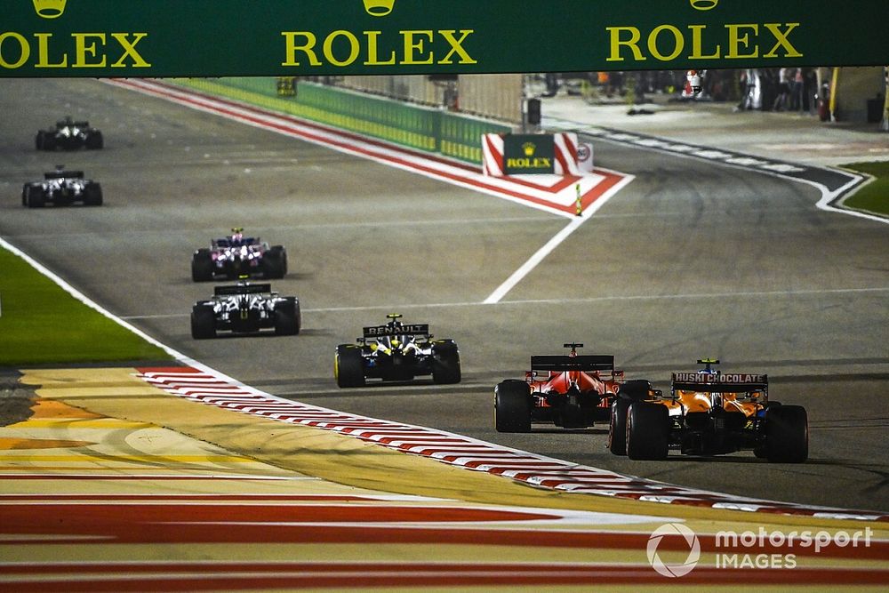 Esteban Ocon, Renault F1 Team R.S.20, Sebastian Vettel, Ferrari SF1000, and Lando Norris, McLaren MCL35