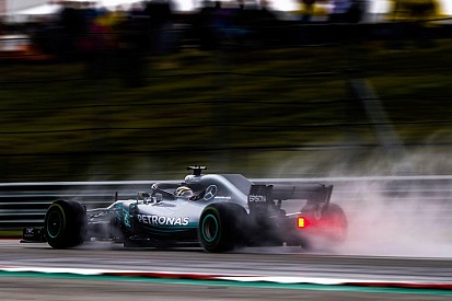 US GP: Hamilton stays on top in rain-hit FP2