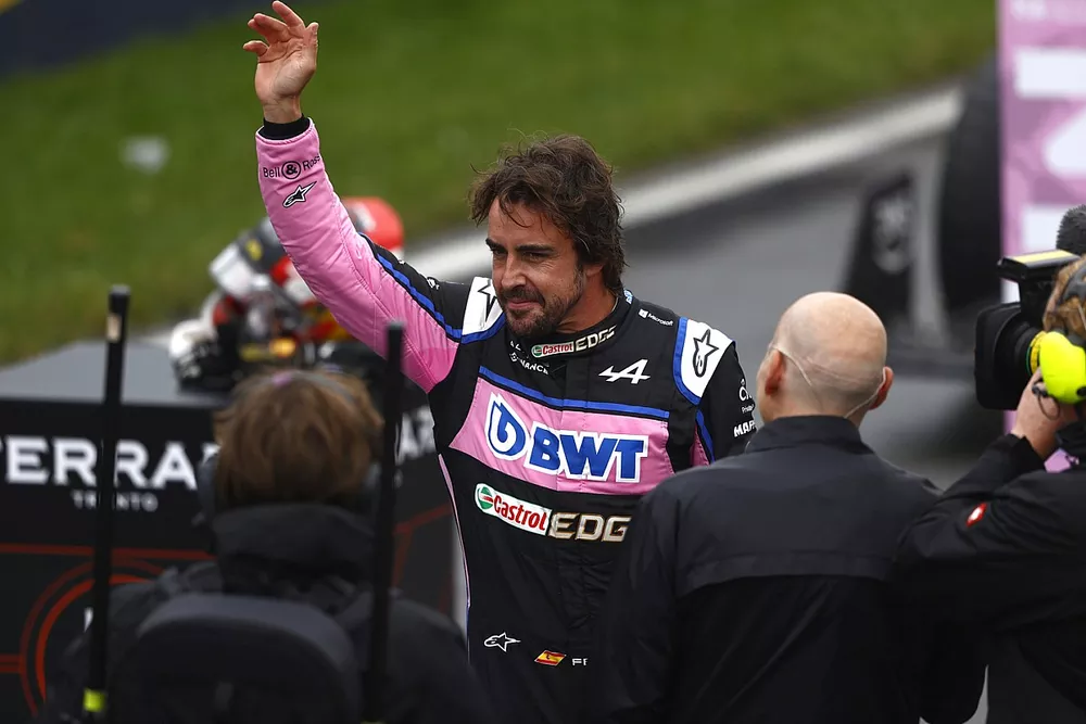 Fernando Alonso, Alpine F1 Team, waves to fans after Qualifying on the front row