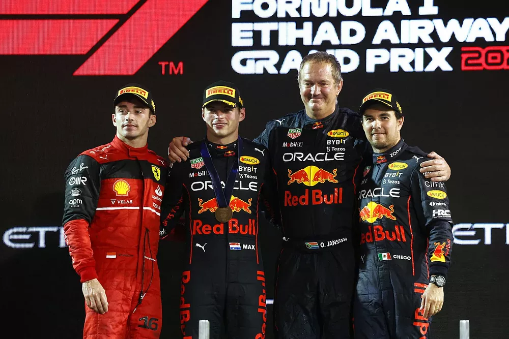 Charles Leclerc, Ferrari, 2nd position, Max Verstappen, Red Bull Racing, 1st position, Olaf Janssen, Trackside Infrastructure Group Leader, Red Bull Racing, Sergio Perez, Red Bull Racing, 3rd position, on the podium