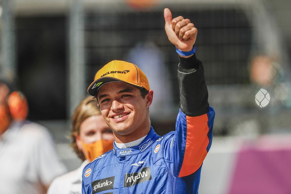 Lando Norris, McLaren, celebrates in Parc Ferme after securing a front row grid position in Qualifying