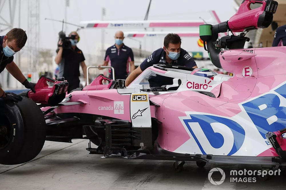Sergio Perez, Racing Point RP20, is returned to the garage