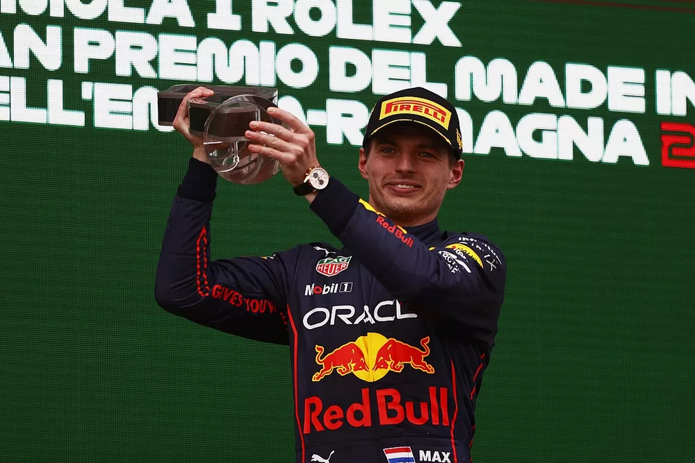 Max Verstappen, Red Bull Racing, 1st position, lifts his trophy on the podium