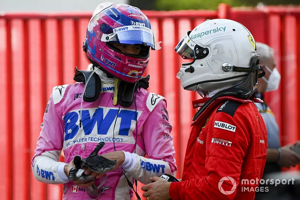 Lance Stroll, Racing Point y Sebastian Vettel, Ferrari, en Parc Ferme después de la carrera