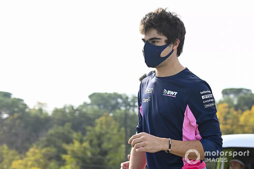 Lance Stroll, Racing Point, walks the track