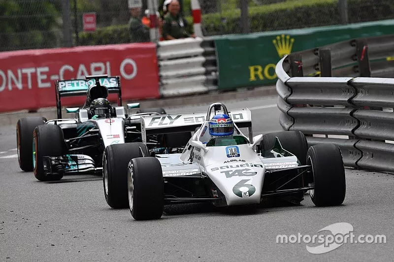 Keke Rosberg, Williams FW08 leads Nico Rosberg, Mercedes-Benz F1 W07 Hybrid