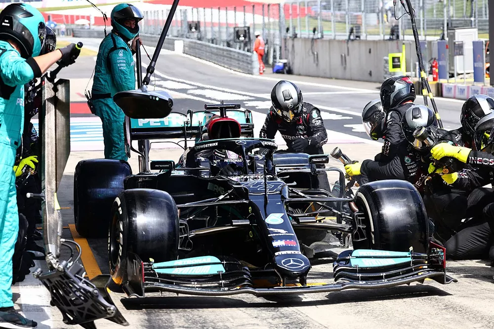 Lewis Hamilton, Mercedes W12, leaves his pit box after a stop