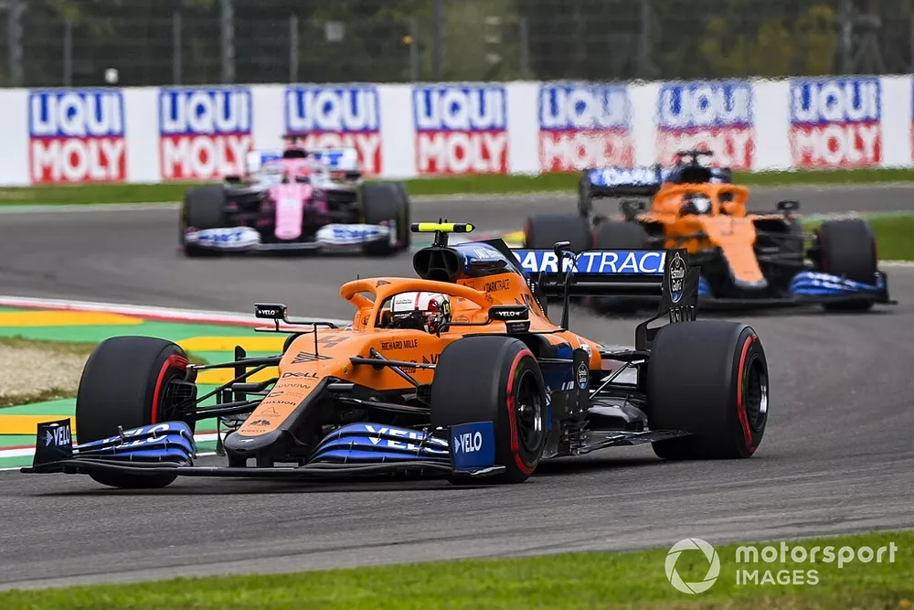 Lando Norris, McLaren MCL35, Carlos Sainz Jr., McLaren MCL35, and Sergio Perez, Racing Point RP20
