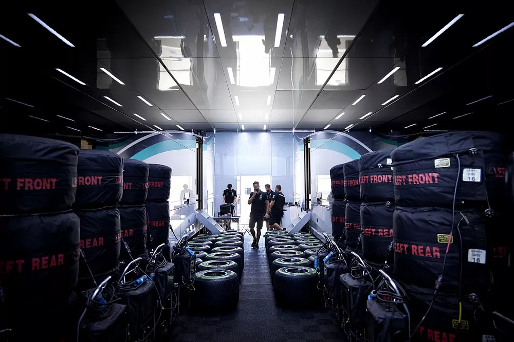 Mercedes team members with Pirelli tyres