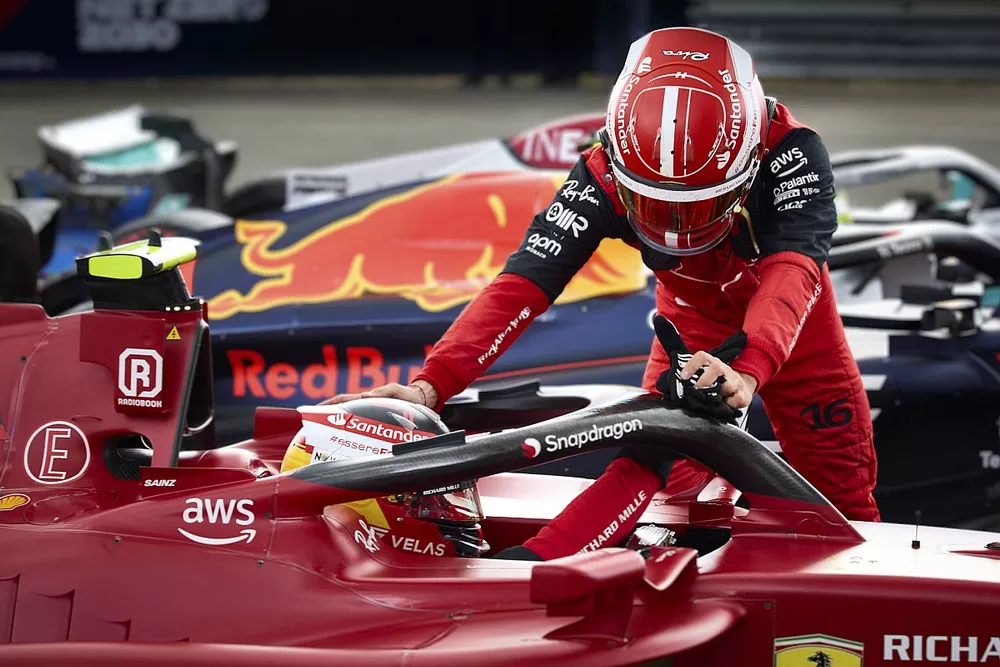 Charles Leclerc, Ferrari, congratulates winner Carlos Sainz, Ferrari, in parc ferme
