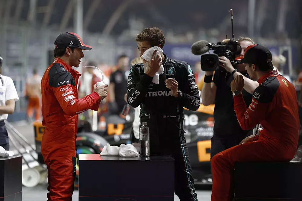 Pole man Carlos Sainz, Scuderia Ferrari, George Russell, Mercedes-AMG, Charles Leclerc, Scuderia Ferrari, in Parc Ferme after Qualifying