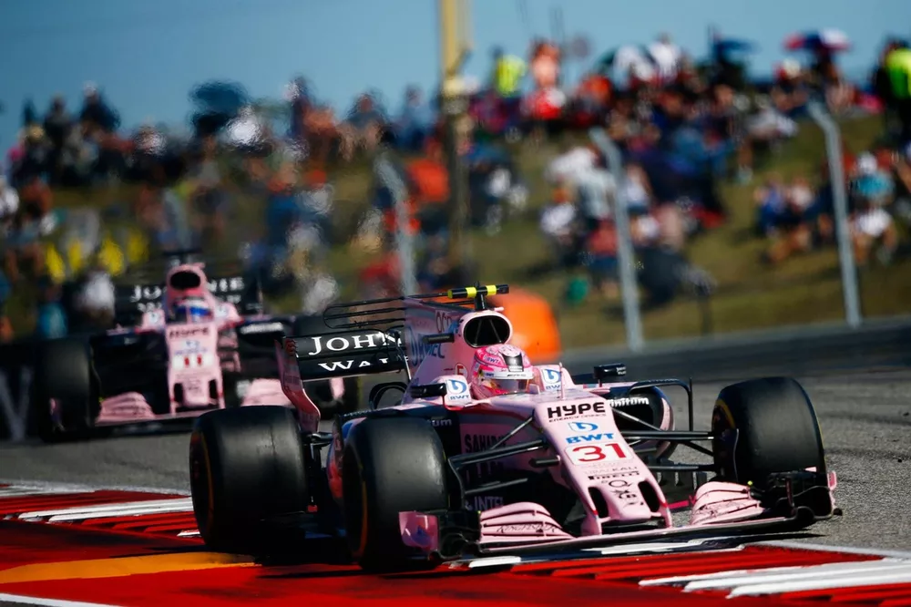 Esteban Ocon, Force India VJM10, leads Sergio Perez, Force India VJM10