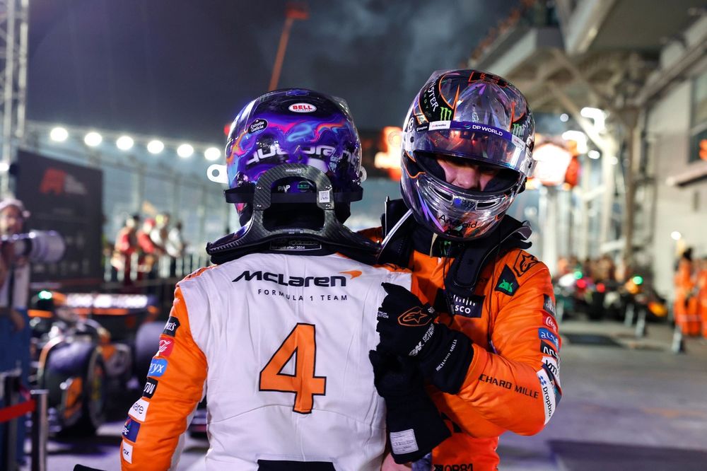 Lando Norris, McLaren F1 Team, 1st position, and Oscar Piastri, McLaren F1 Team, 3rd position, congratulate each other in Parc Ferme