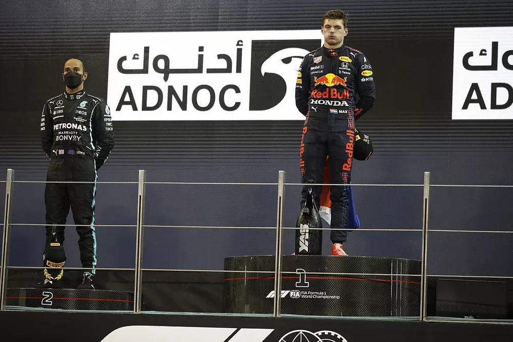Lewis Hamilton, Mercedes, 2nd position, Max Verstappen, Red Bull Racing, 1st position, on the podium