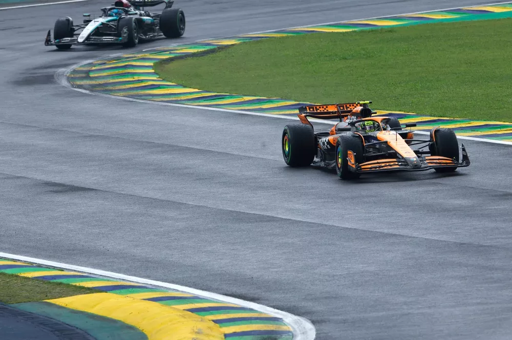 Lando Norris, McLaren MCL38, leads George Russell, Mercedes F1 W15