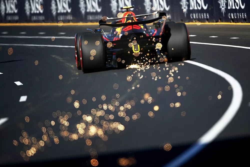 Sparks trail from Sergio Perez, Red Bull Racing RB18