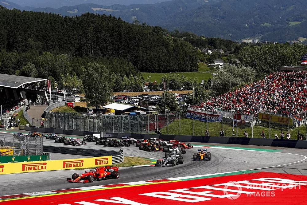 Charles Leclerc, Ferrari SF90 leads Valtteri Bottas, Mercedes AMG W10, Lewis Hamilton, Mercedes AMG F1 W10 and Lando Norris, McLaren MCL34 at the start of the race 